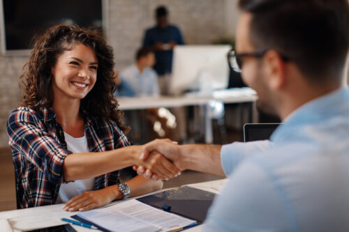 Handshake in a professional setting.