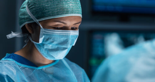 Surgeon focused in operating room